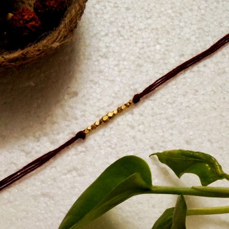 Classic Handmade Rakhi: Brass Beads Style