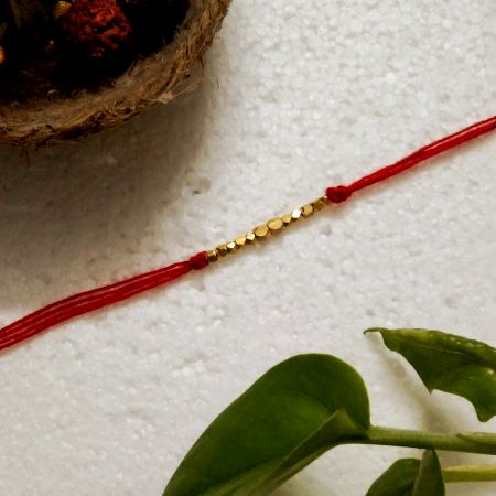 Elegant Brass Beads Rakhi for Brothers