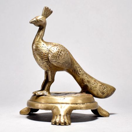 Brass Peacock Figurine on Table